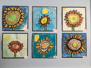 Completed 3rd grade sunflowers in Mr. Satterfield's office
